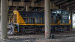 Watco Switcher Sitting Under a Bridge